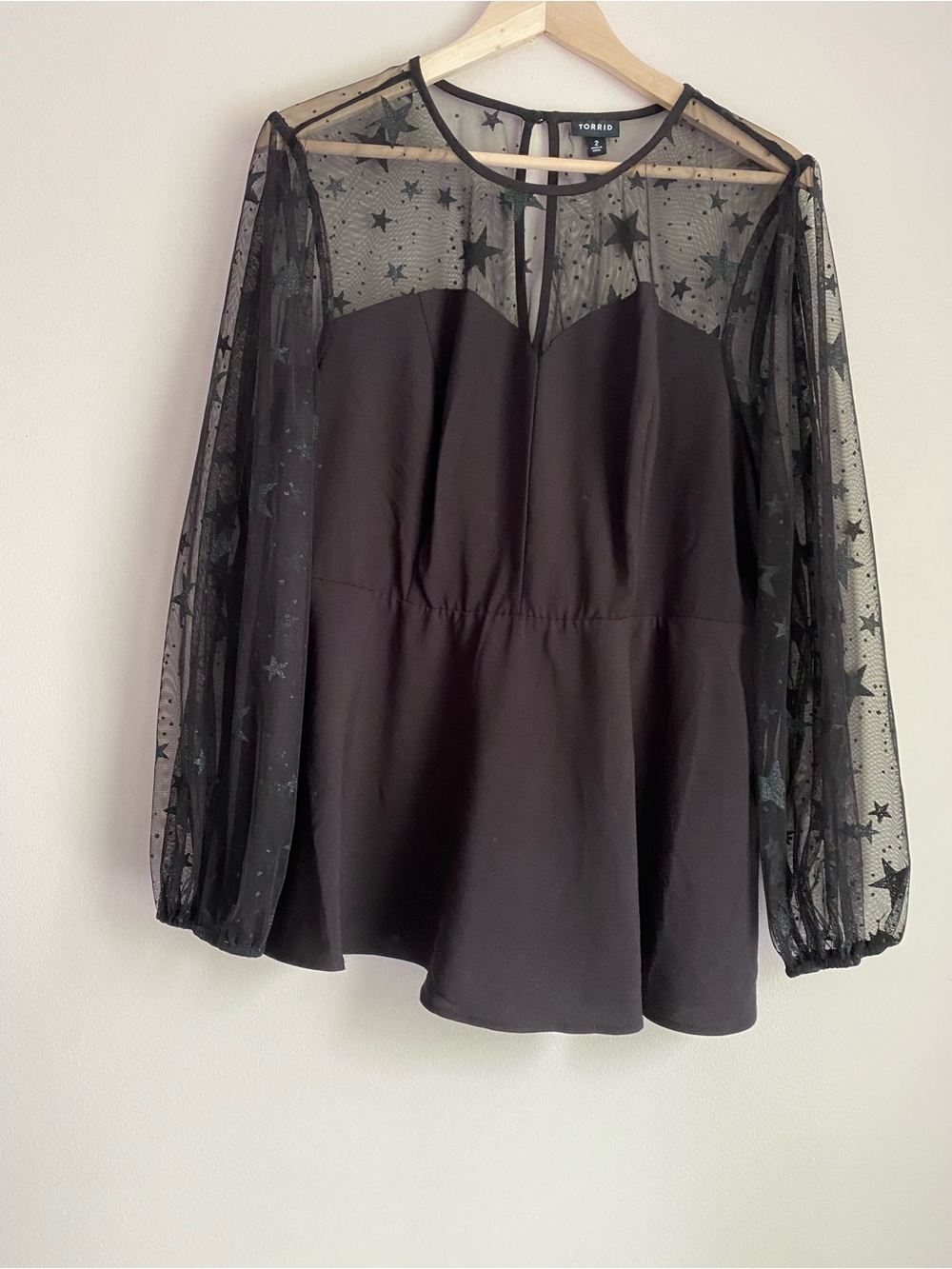Torrid black blouse star sheer sleeves size 2